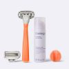 Flamingo Starter Set in the color Papaya, featuring a razor, shower holder, extra blade, and mini 1oz foaming shave gel